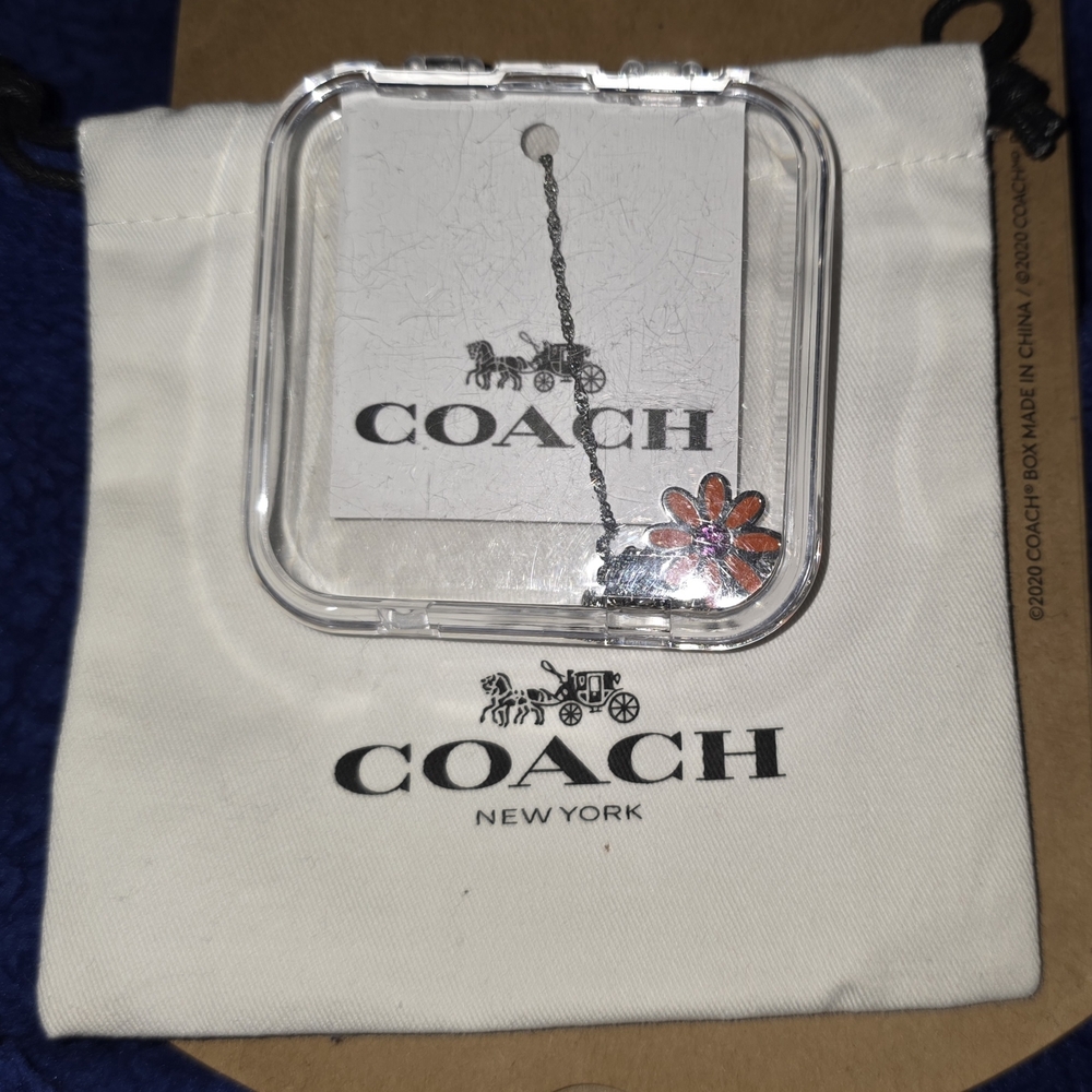 COACH Silver And Orange Daisy Pendant Necklace - Picture 5 of 6
